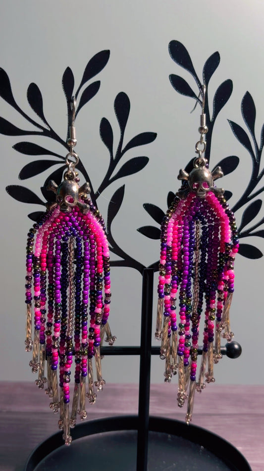 Handmade beaded earrings with skull charms