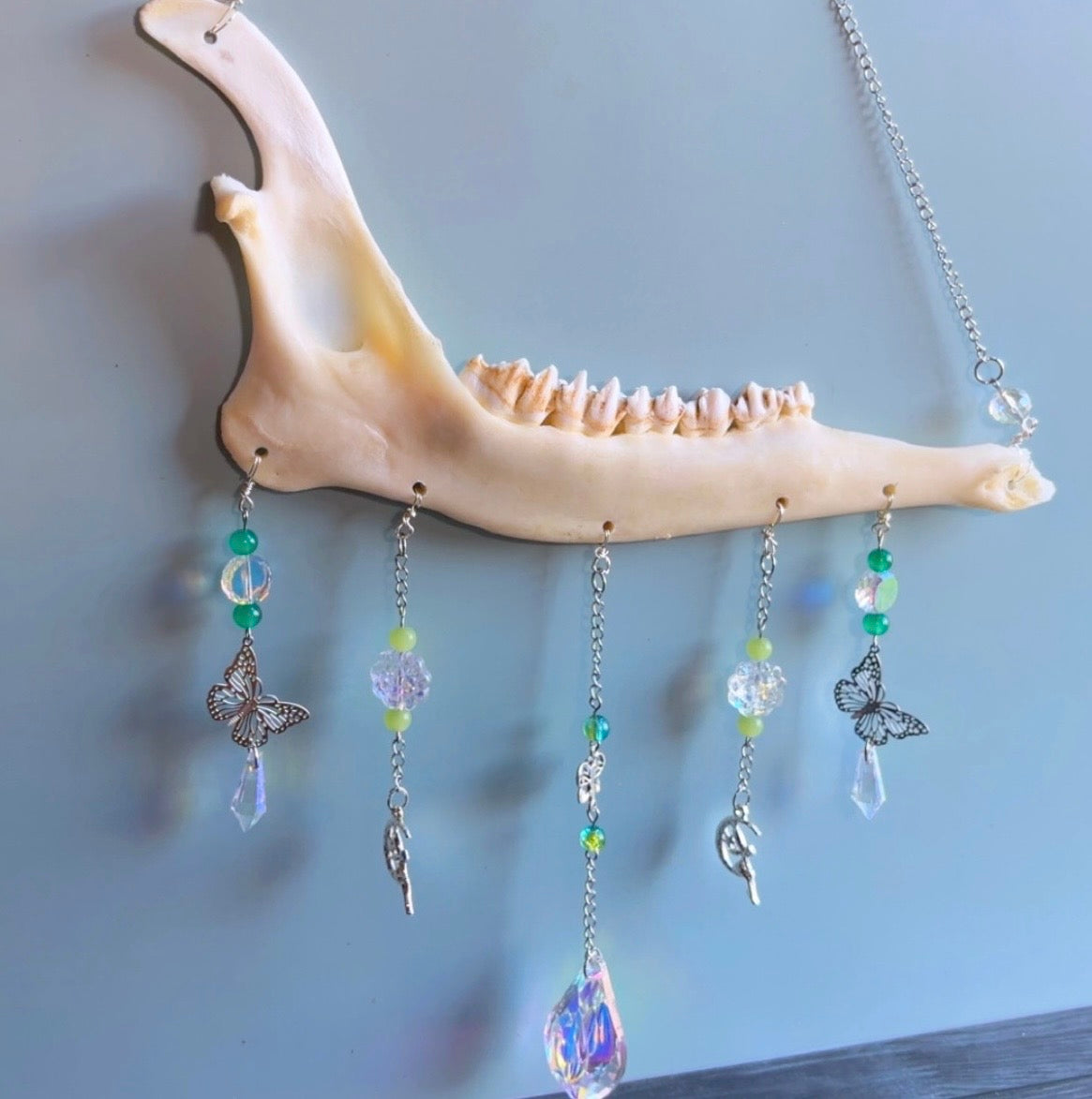Handmade deer jawbone suncatcher