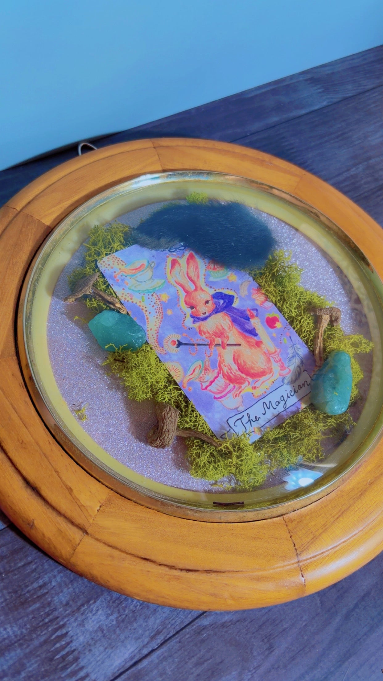 Handmade framed art with a taxidermy rabbit foot