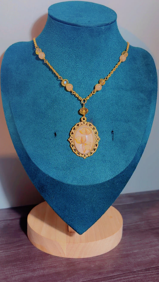 Handmade cotton sprig cameo necklace