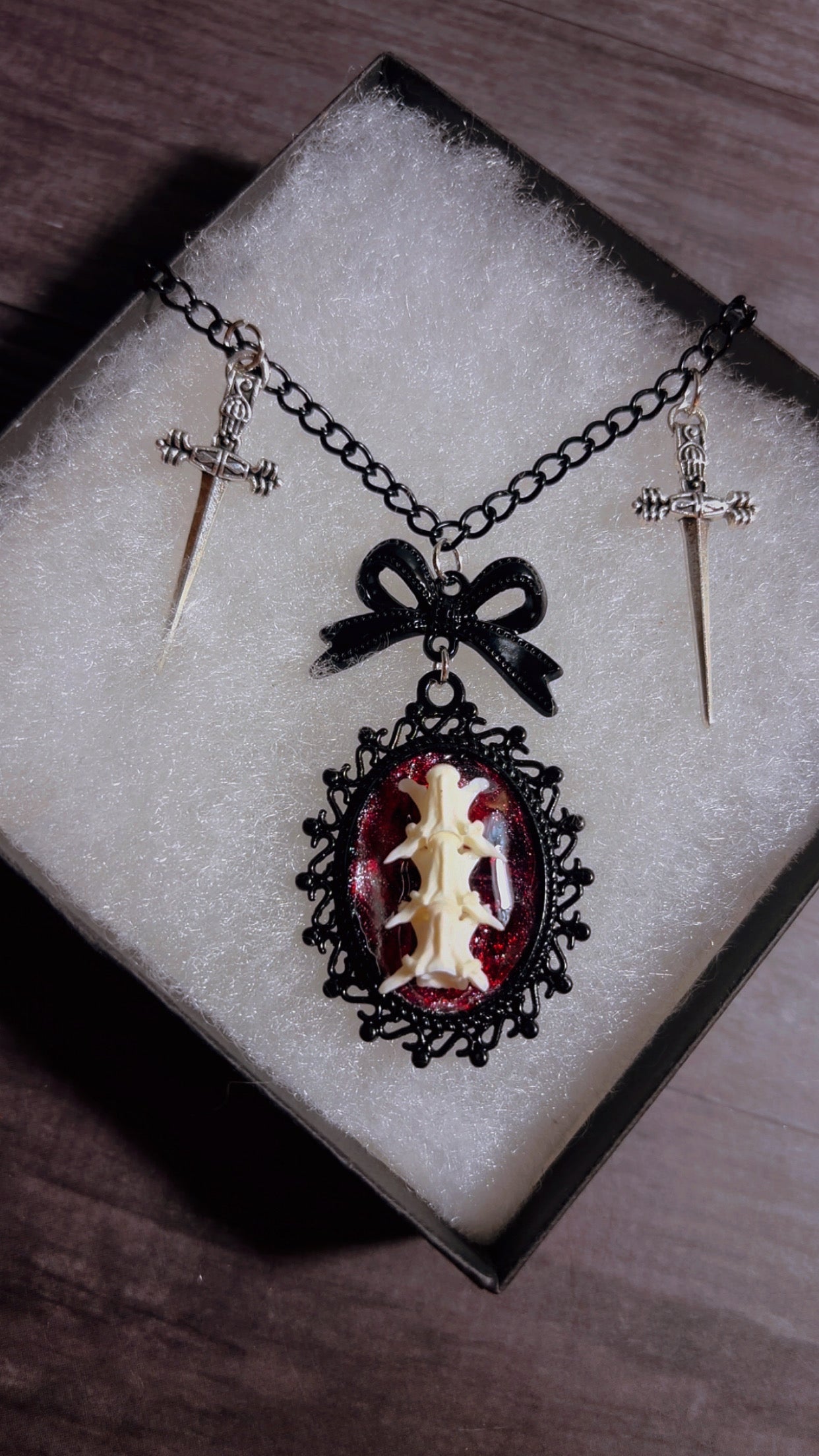Handmade snake vertebrae cameo necklace