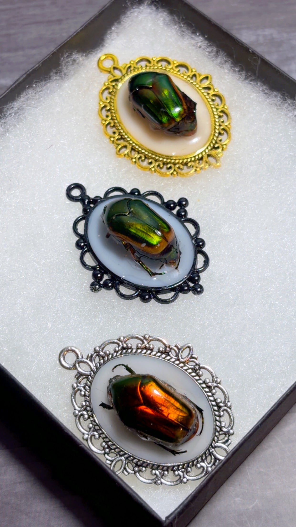 Handmade beetle cameo pendants