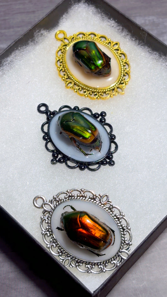 Handmade beetle cameo pendants