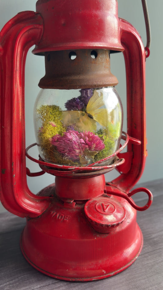 Handmade oddity art piece featuring a vintage lantern