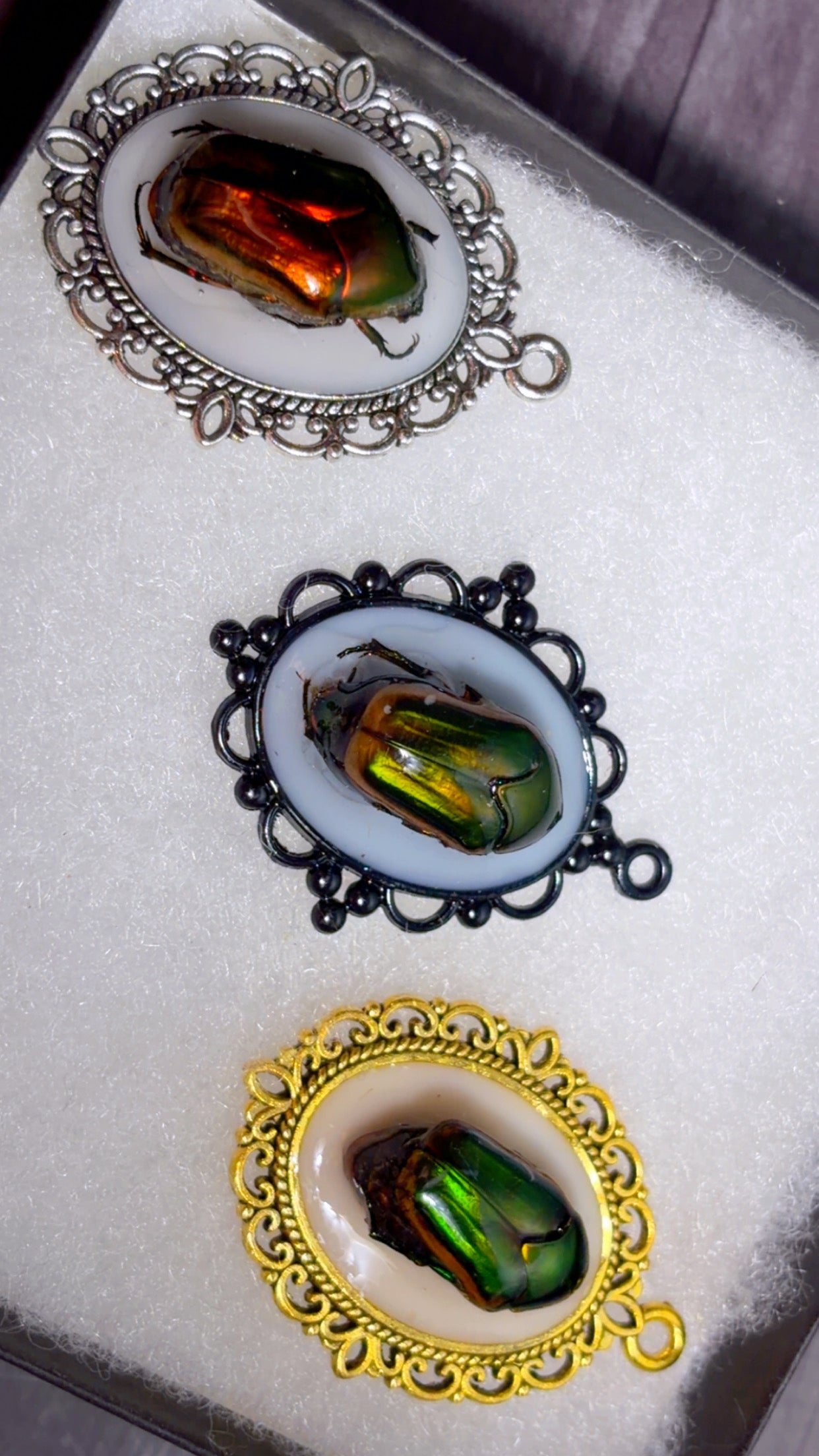 Handmade beetle cameo pendants