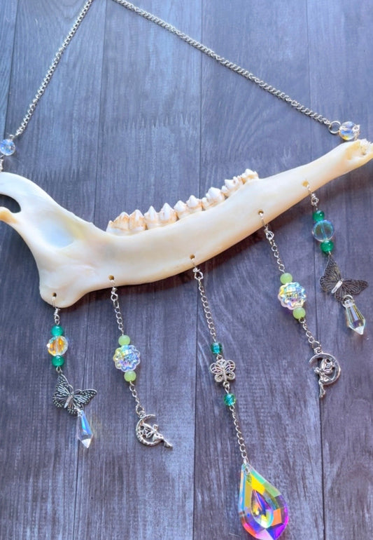 Handmade deer jawbone suncatcher
