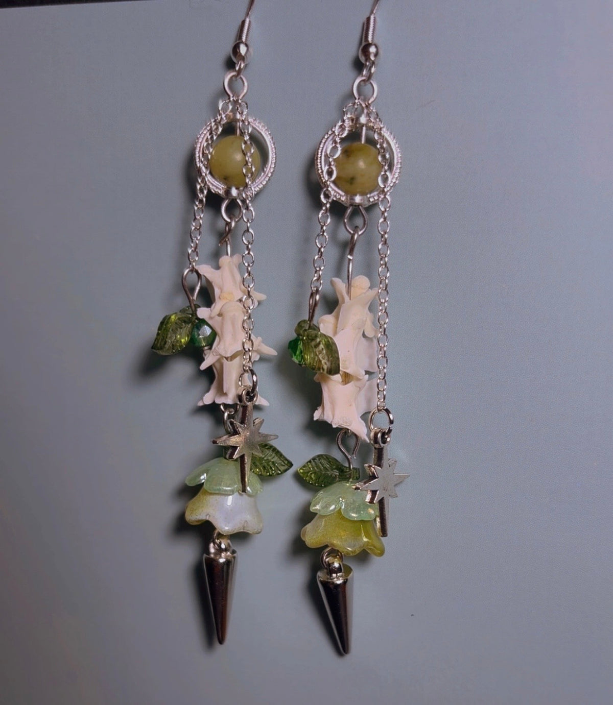 Handmade snake vertebrae and green jade earrings