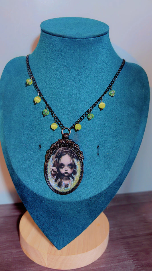 Handmade creepy child cameo necklace