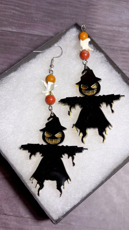 Handmade scary scarecrow and snake vertebrae earrings