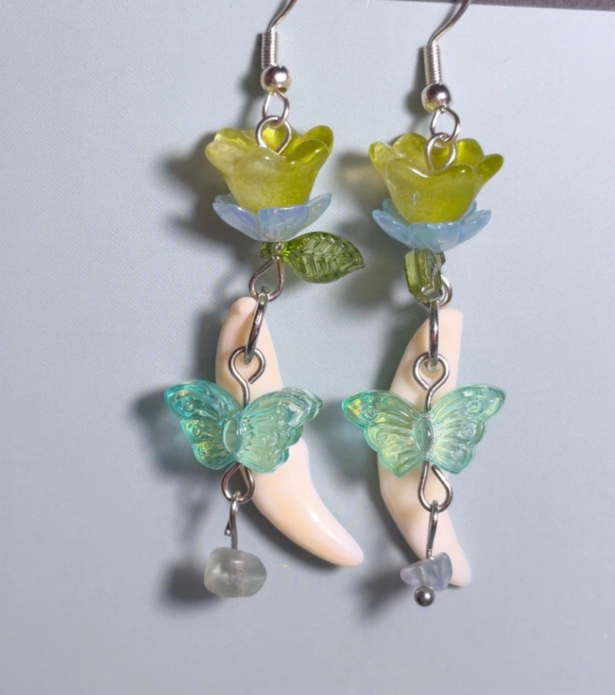 Handmade coyote fang earrings