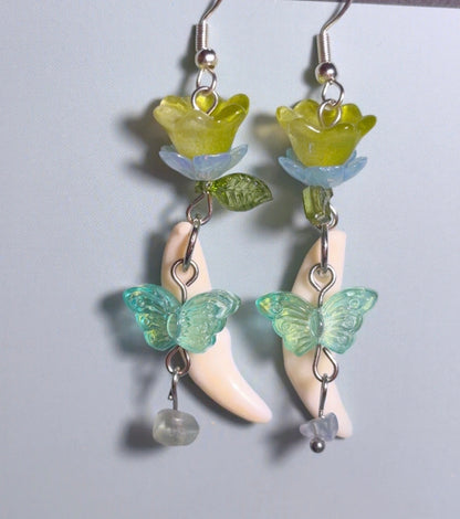 Handmade coyote fang earrings