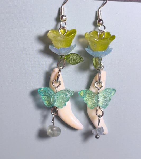 Handmade coyote fang earrings