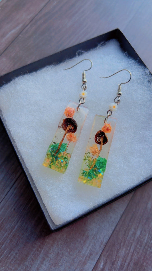 Handmade earrings with real mushrooms