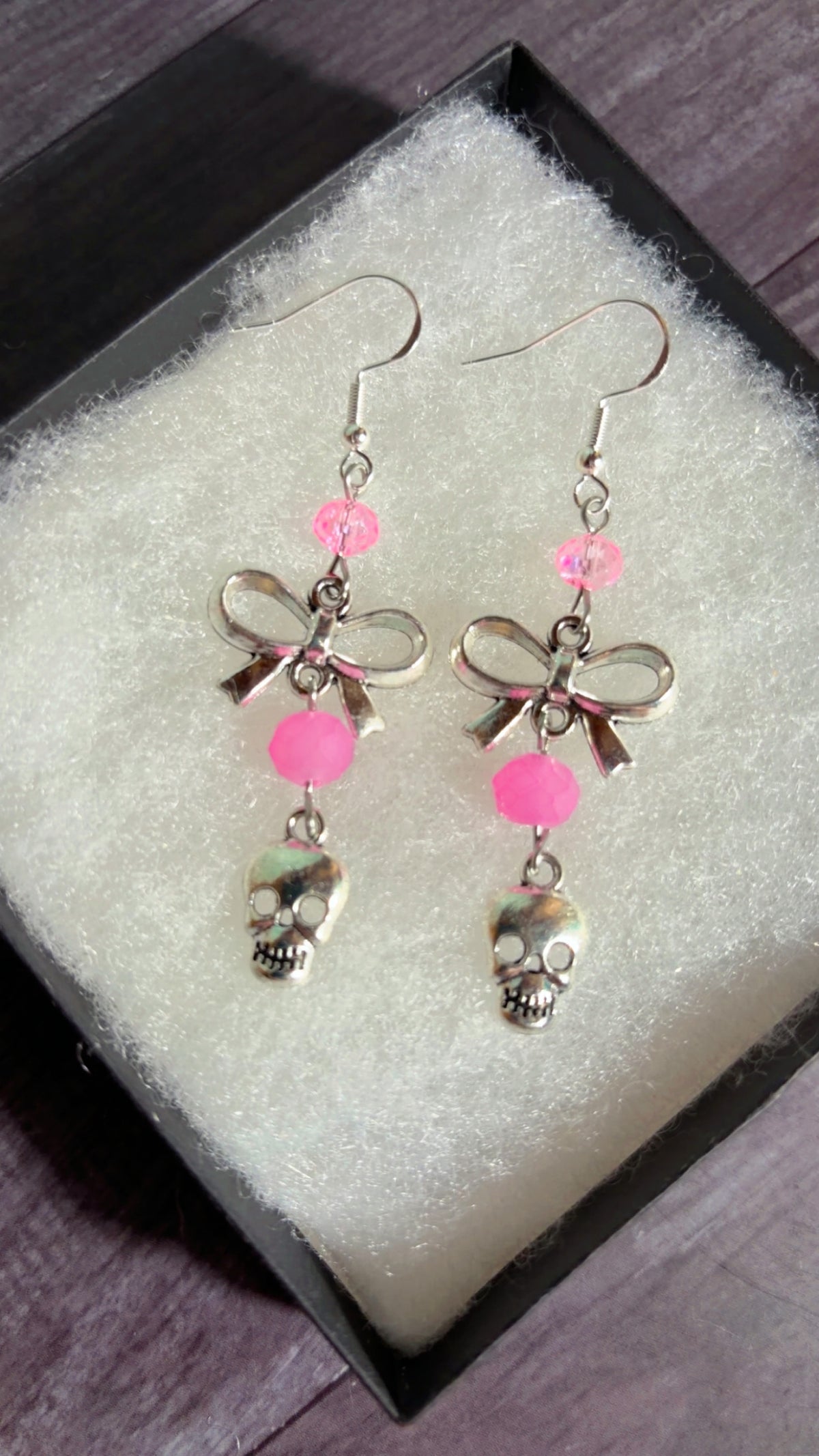 Handmade coquette skull earrings