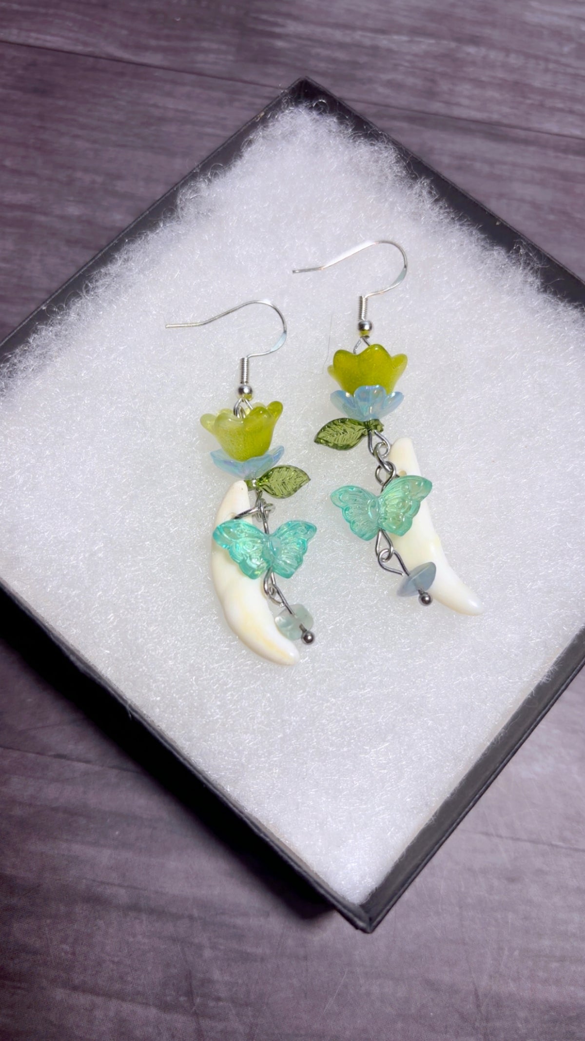 Handmade coyote fang earrings