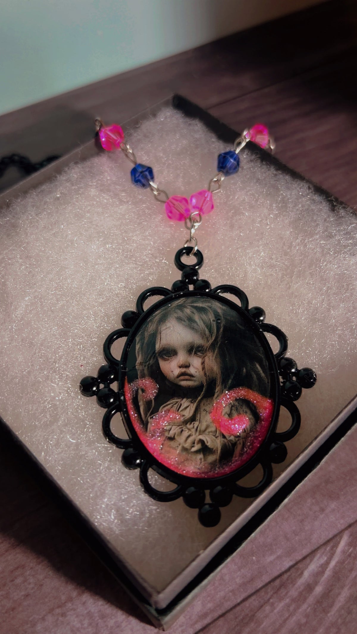 Handmade creepy horror film child cameo necklace