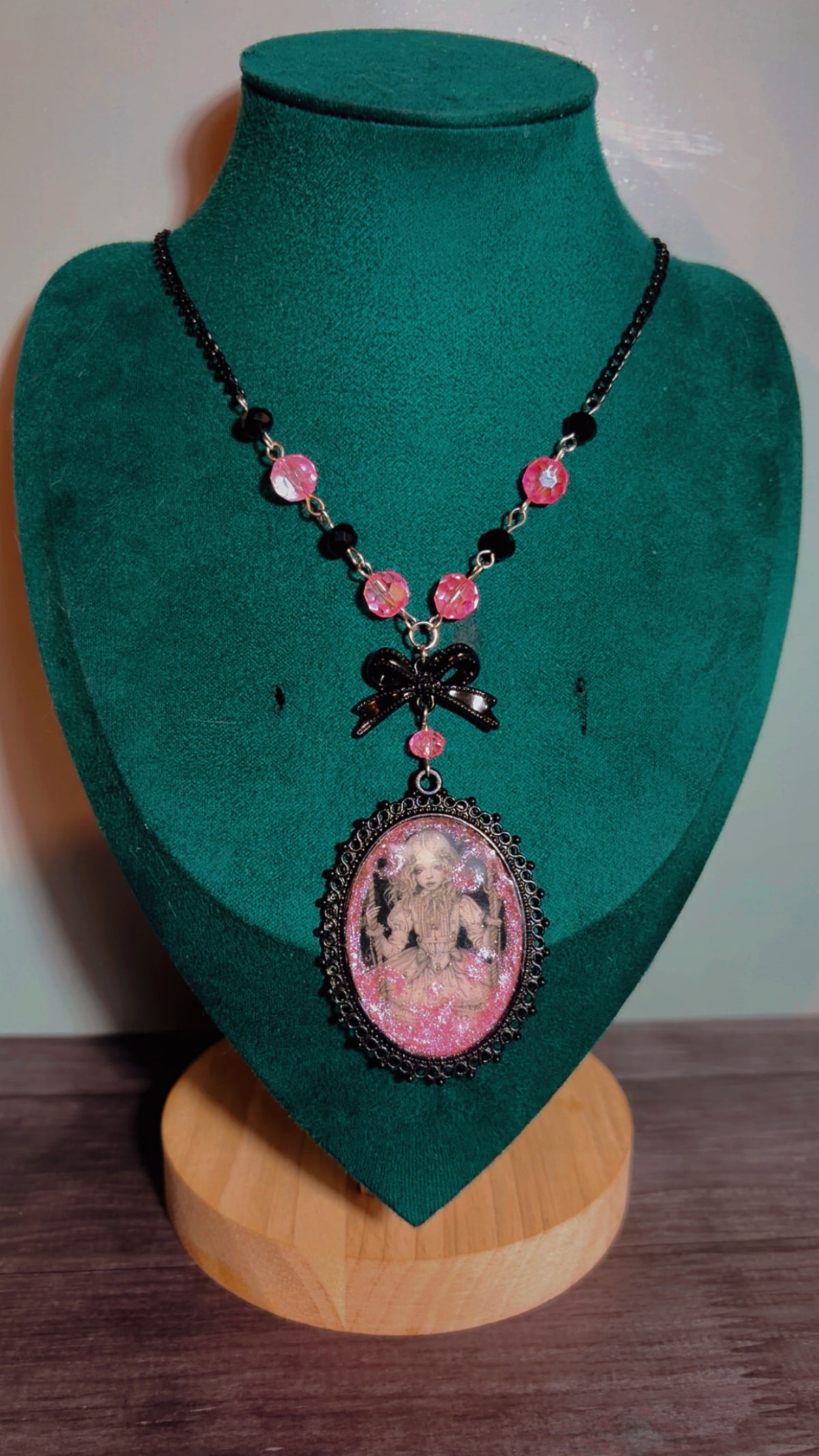 Handmade creepy coquette swinging doll cameo necklace