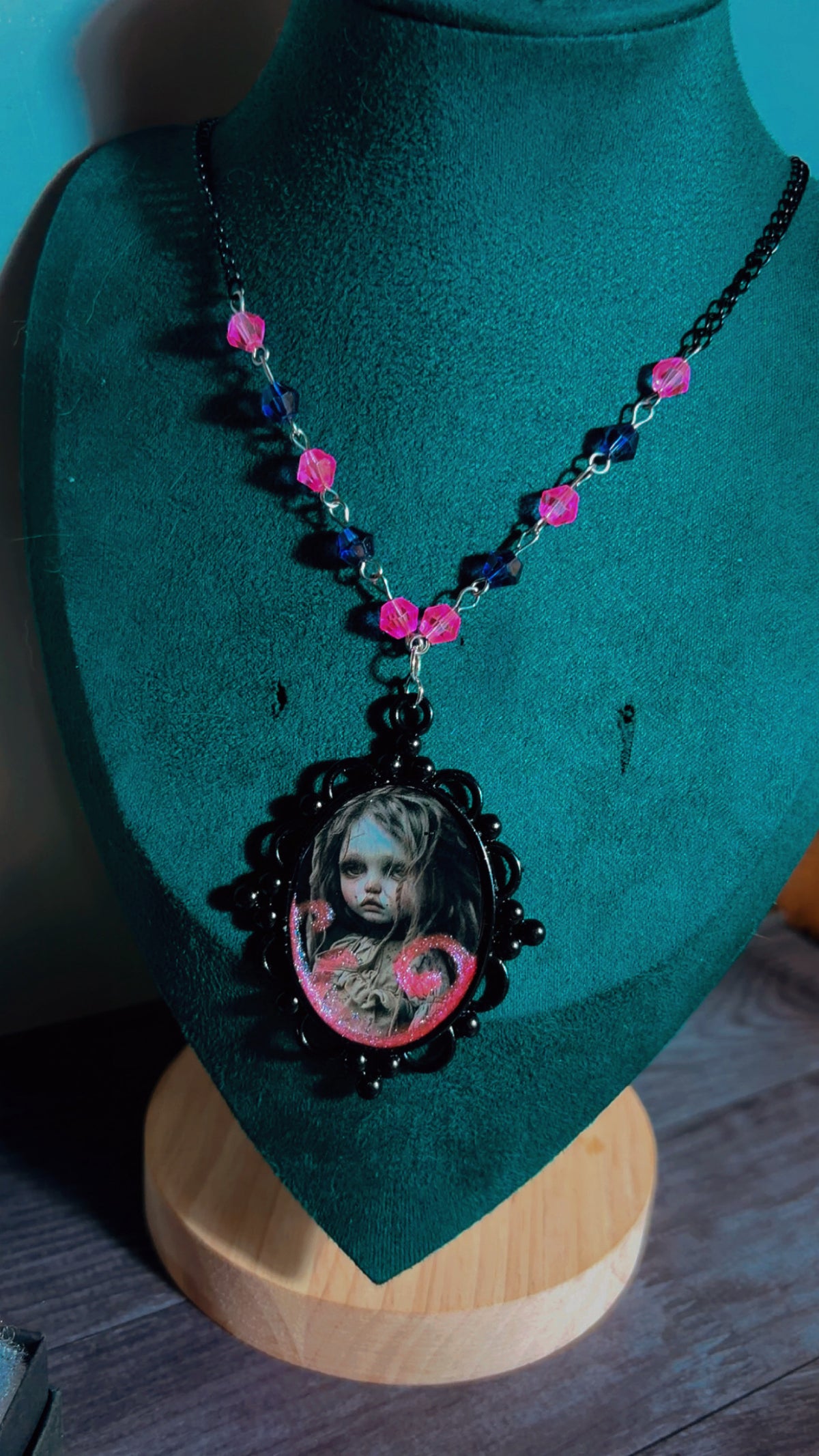 Handmade creepy horror film child cameo necklace