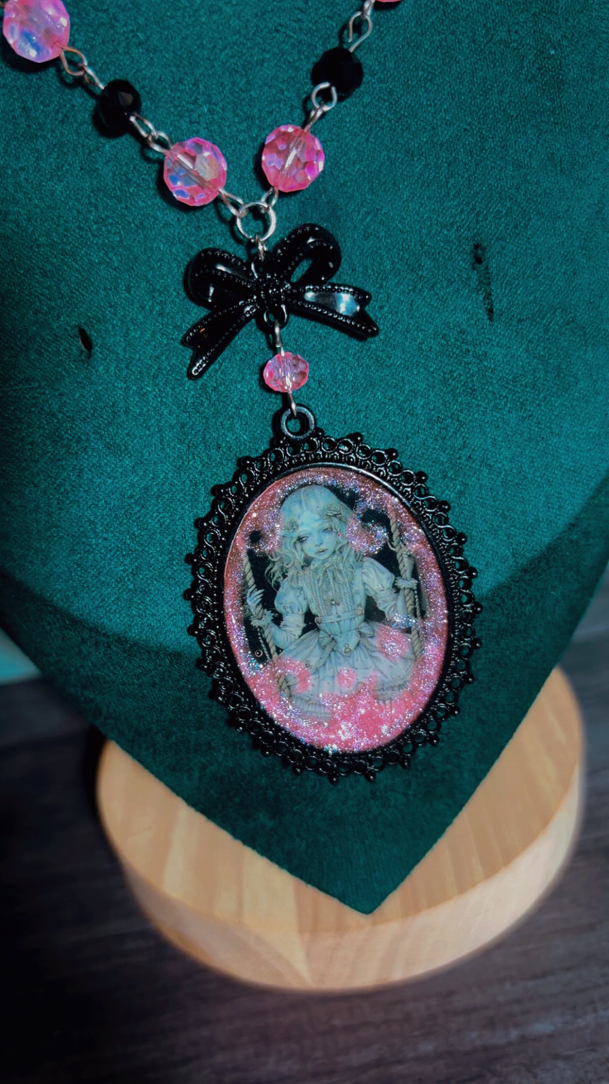 Handmade creepy coquette swinging doll cameo necklace