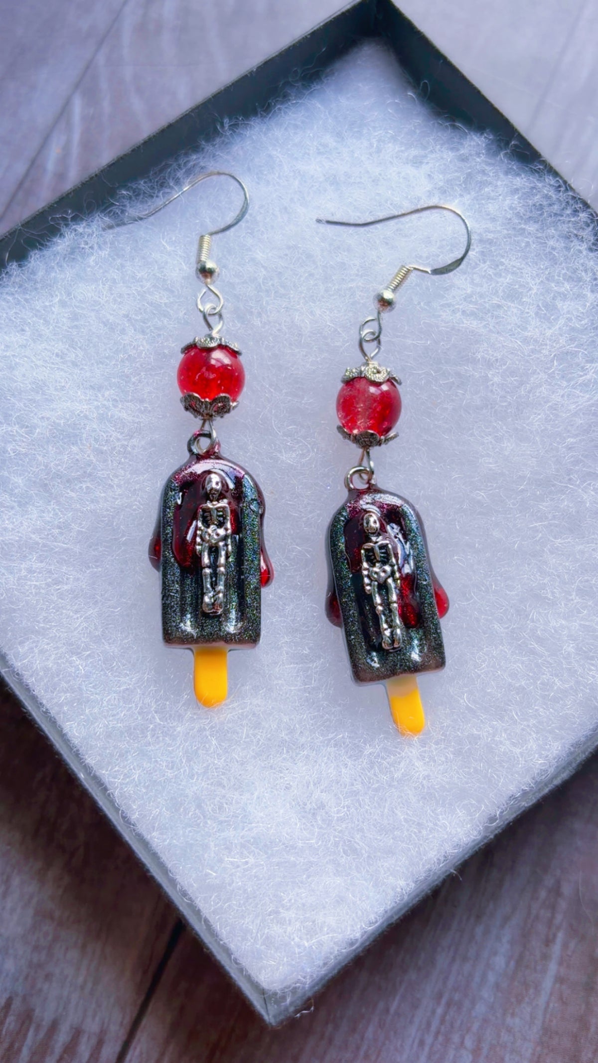 Handmade skeleton popsicle earrings