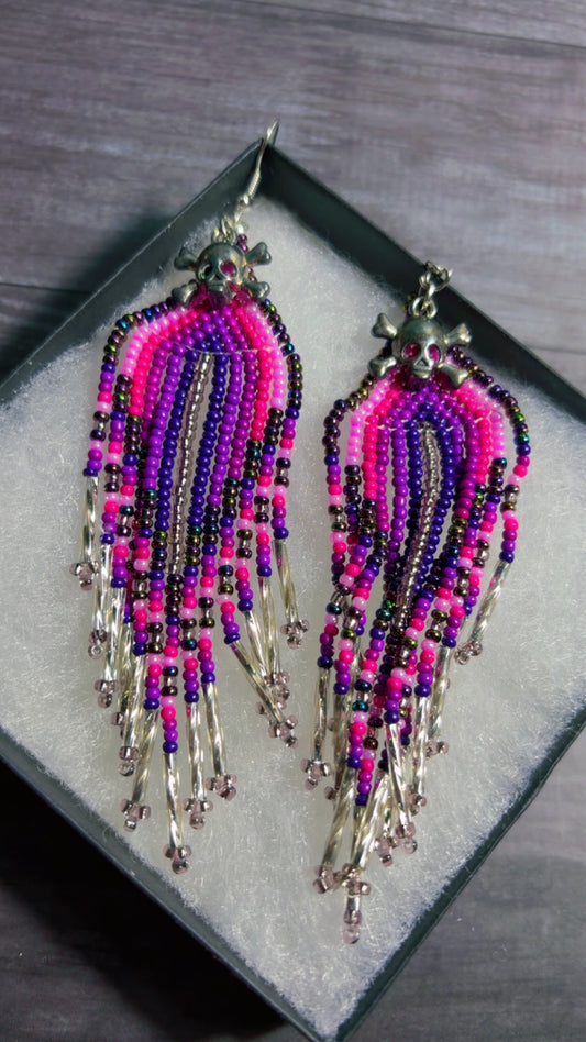 Handmade beaded earrings with skull charms