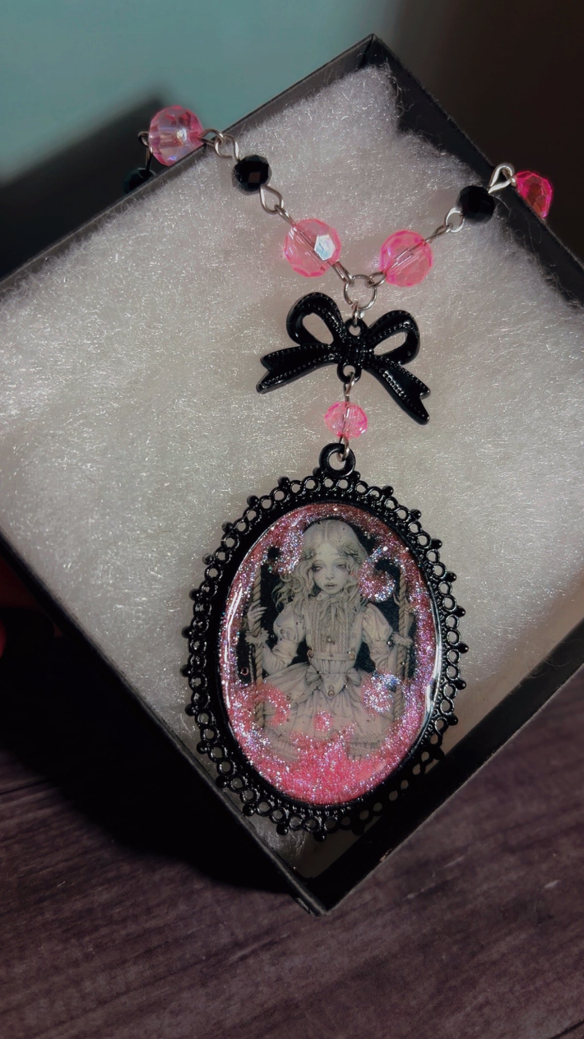 Handmade creepy coquette swinging doll cameo necklace