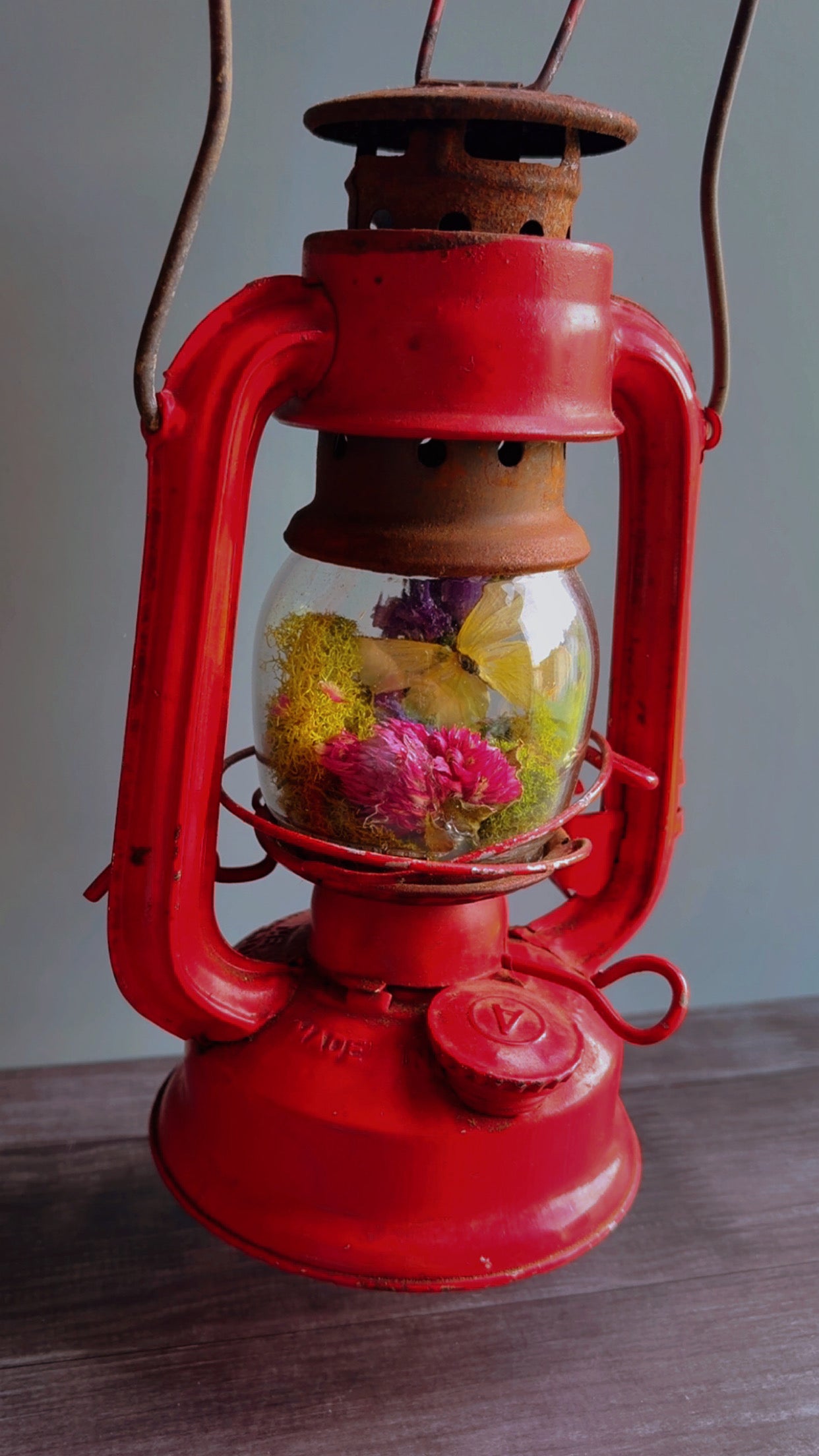 Handmade oddity art piece featuring a vintage lantern