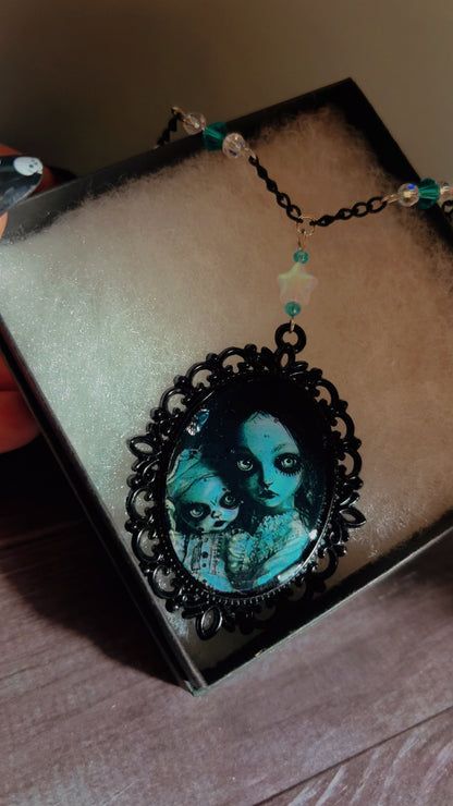 Handmade creepy mother and daughter doll cameo necklace