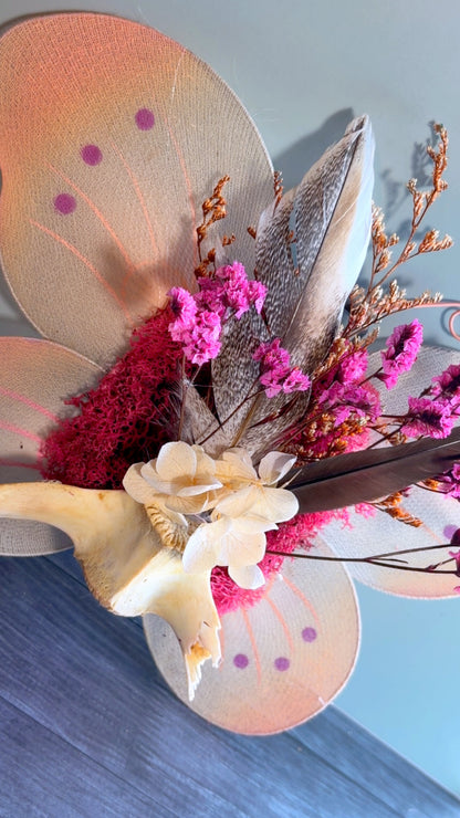 Handmade floral & feather arrangement with deer vertebrae bone