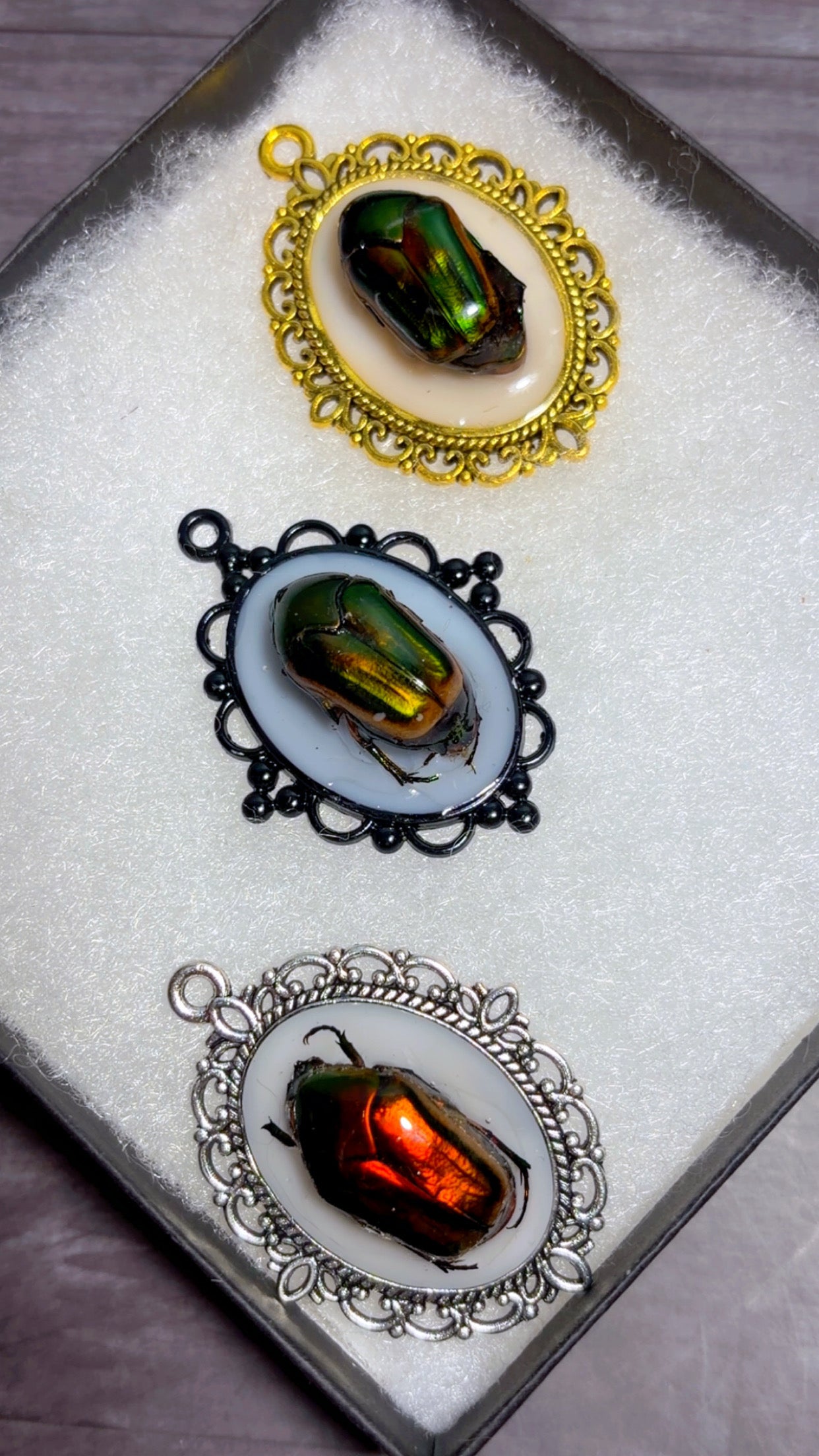 Handmade beetle cameo pendants