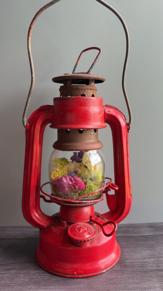 Handmade oddity art piece featuring a vintage lantern