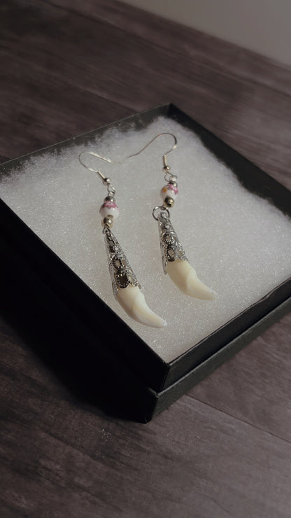 Handmade real coyote fang earrings