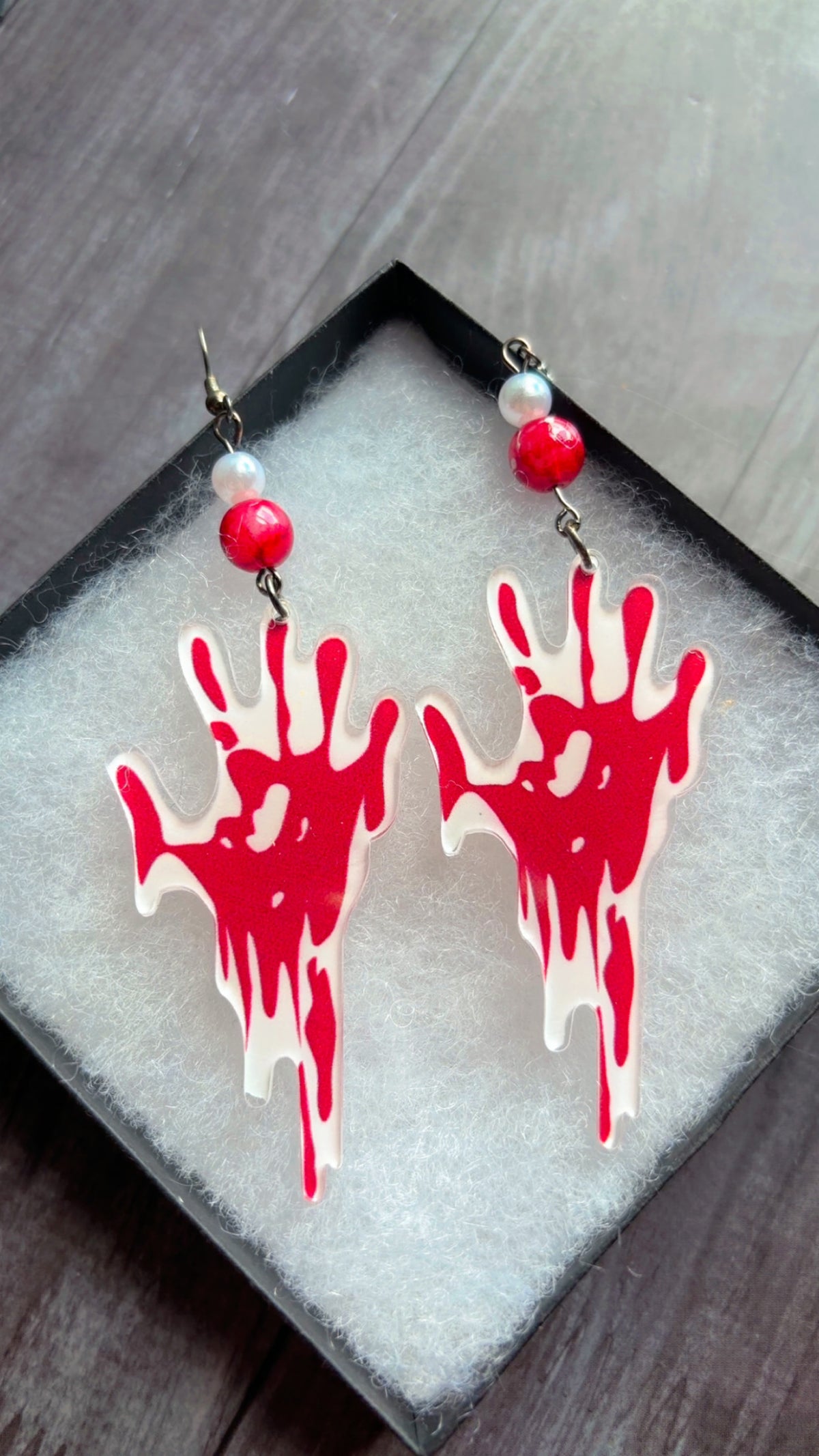 Handmade bloody handprint earrings