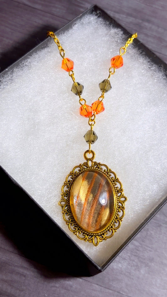 Handmade regal moth wing cameo necklace
