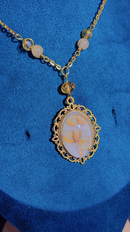 Handmade cotton sprig cameo necklace