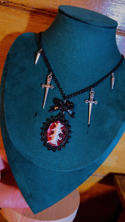 Handmade snake vertebrae cameo necklace