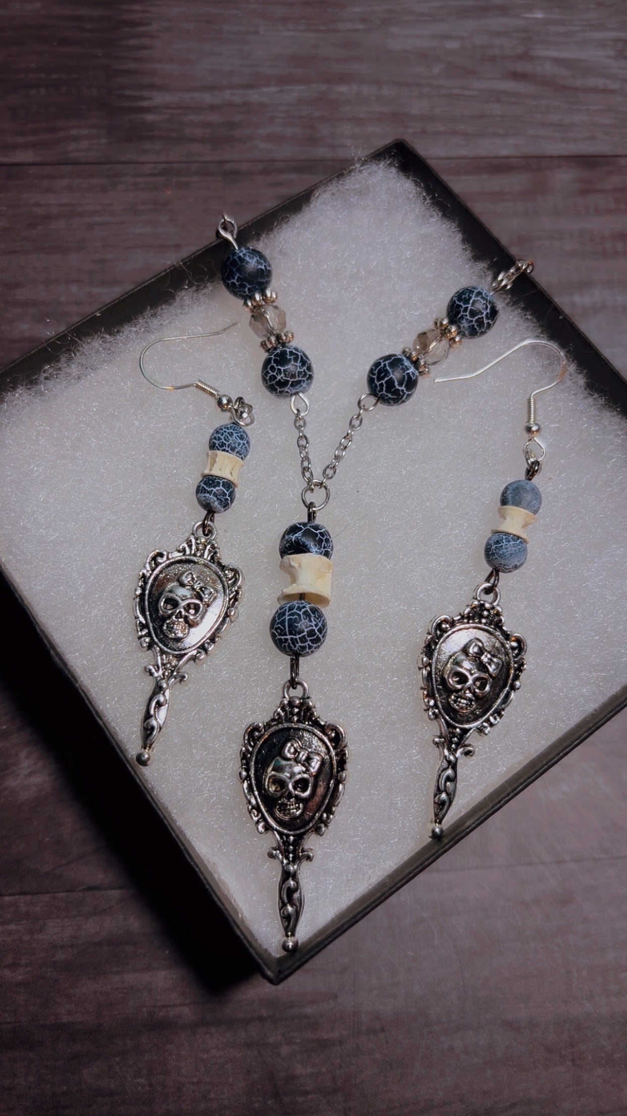 Handmade skull mirror set with shark vertebrae
