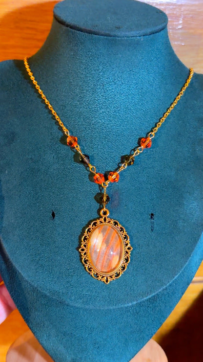 Handmade regal moth wing cameo necklace