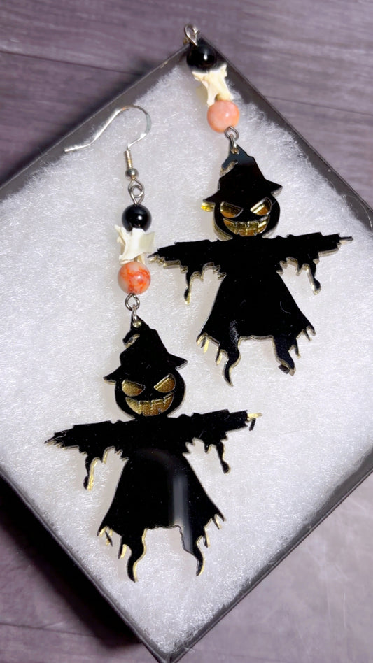 Handmade scary scarecrow and snake vertebrae earrings