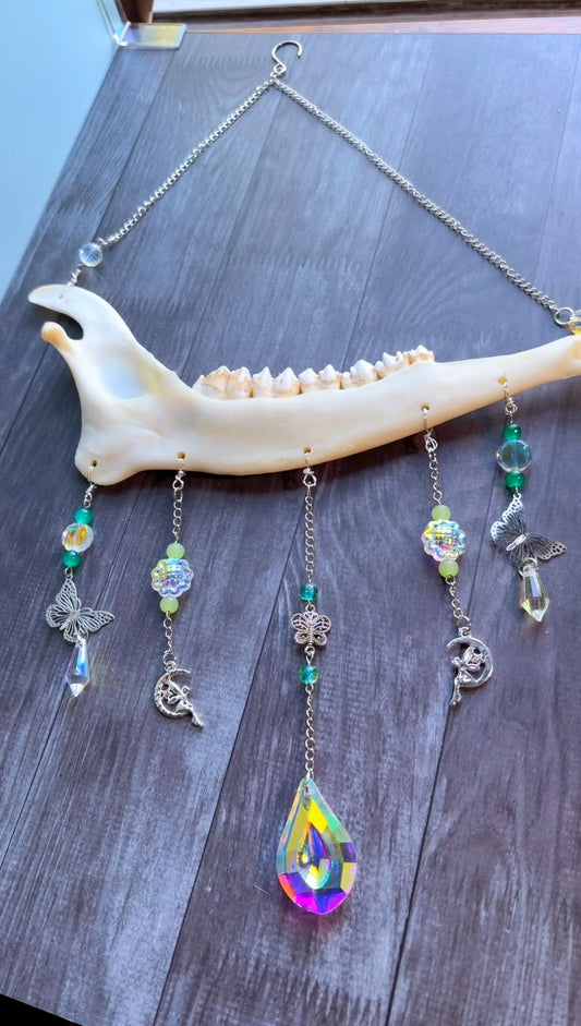Handmade deer jawbone suncatcher