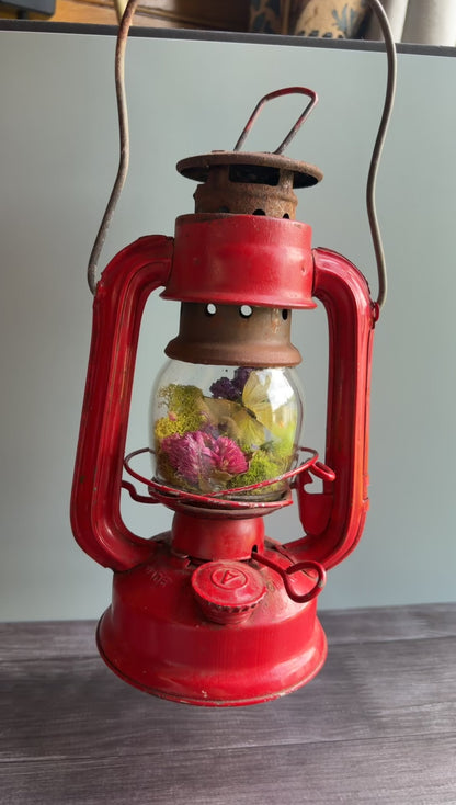 Handmade oddity art piece featuring a vintage lantern